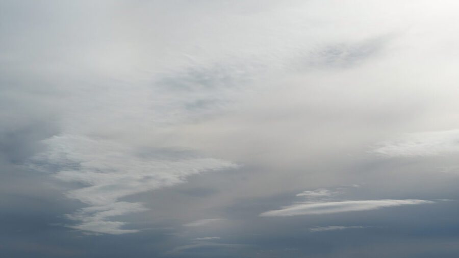 Altostratus: grey mid-level sheet with a watery sun