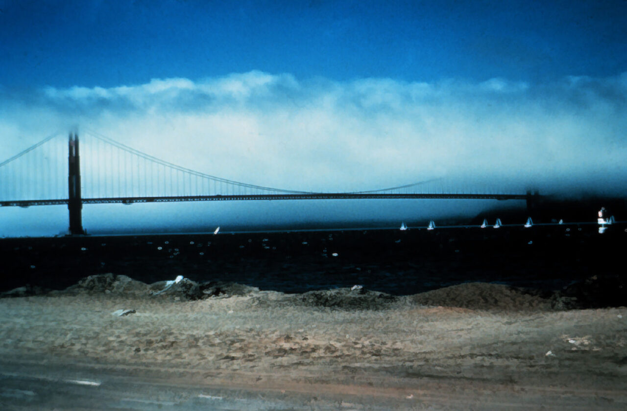 A low fog bank rolling in over the water